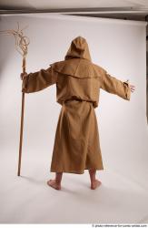 JOEL_ADAMSON STANDING POSE WITH A MAGIC STICK